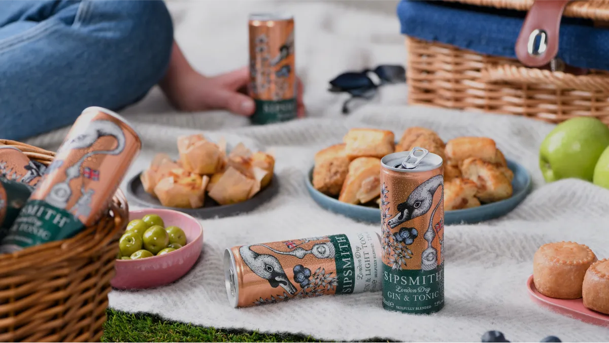 image of many Sipsmith Gin & Tonic cans placed on picnic table
