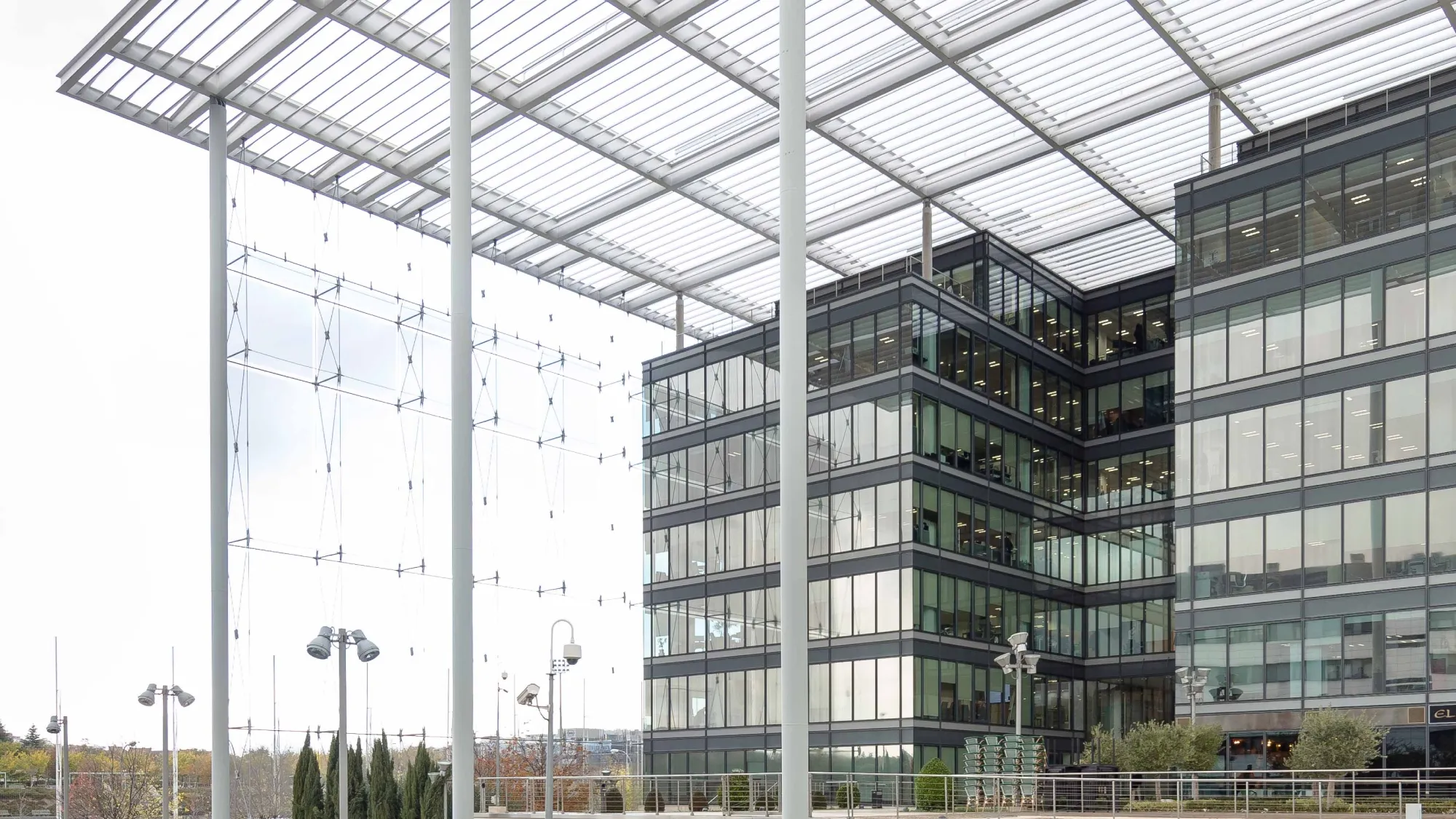 Outside view of the tall, glass structure of Suntory Global Spirits' international hub.